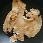The pancake tore and stuck to the pan