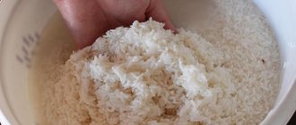 Man rinses rice in a bowl of water