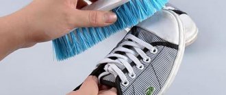 Cleaning sneakers with a brush