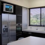 Is it possible to put a TV on a refrigerator - Where to put a TV in the kitchen