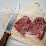 Knife and meat for chops