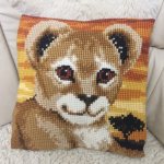 cross stitch lion pillow
