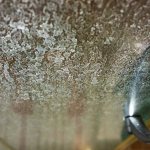 PREVENTION OF LIME SCALE DEPOSITION ON THE GLASS OF A SHOWER CABIN