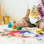 Child and paint